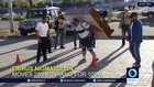 Russian man carries piano on his back