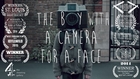 The Boy with a Camera for a Face