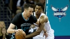 Hornets top Heat to win first playoff game in 14 years