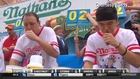 Hot dog eating champ gobbles down 61 hot dogs