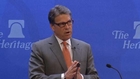 Indicted Texas Governor Perry cautions Obama over executive authority