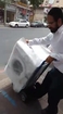 Israeli Man Takes Home New Washing Machine via Public Transport !