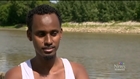 Somali refugee claimant swims across Red River, arrives in Canada..