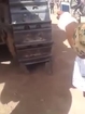 Crazed Iraqi shiite terrorists have fun by parking a bulldozer on a Sunni male