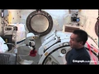 Robot and astronaut bid farewell on International Space Station