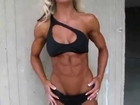 beautiful fitness girl posing abs natural muscle female