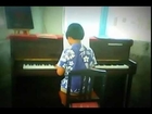 Paul plays piano - 10 years old
