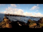 JGSDF and US Marines train side-by-side in small boats