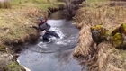 Man Slips and Falls into Stream