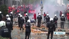 Protesters clash with riot police near US embassy in Brussels