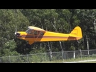 J3 Cub take-off in gusty conditions at Muskoka (CYQA) , Ontario, Canada..