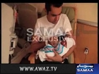 Moulana Tariq Jameel giving the azan in the ear of Veena Malik's new born son Abram