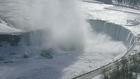 Climbers scale frozen Niagara Falls - Amazing Footage